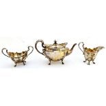 A Scottish silver three piece tea set, comprising; a teapot,