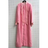 A vibrant baby pink coat by Lord and Taylor;