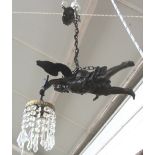 A patinated spelter figural ceiling light, early 20th century,