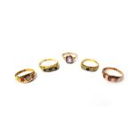 An 18ct gold, sapphire and diamond set five stone ring, Birmingham 1923, an 18ct gold,