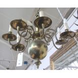 A Dutch 18th century style seven branch brass chandelier, 55cm high,