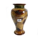 A Royal Doulton stoneware vase decorated in the 'Autumn Leaves' pattern against a baluster ground,