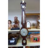 A Regency mahogany cased wheel barometer and thermometer by L. Arnaboldi, London, 97cm high.