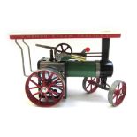 A Mamod TE1a steam tractor, a Mamod SW1 steam wagon, and a Mamod miniature grinding machine,