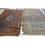 A Ghasghai rug, Persian, the indigo flower-filled field with an ivory diamond, madder spandrels,