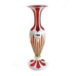 A cranberry and white enamel glass vase, late 19th/early 20th century,