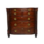 An early 19th century Scottish mahogany bow front chest,