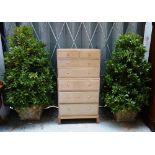 A set of four composite stone planters, each with lattice work tapering square body,