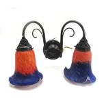 A pair of orange and blue coloured glass dished ceiling lights in gilt wrought iron frames,