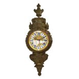 A French gilt bronze cartel clock, late 19th century, cast with angel and Bacchus masks,