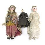 Two bisque porcelain dolls, circa 1900, probably German, unmarked, both with stuffed leather bodies,