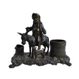 An early 19th century patinated bronze figural desk tidy, early 19th century,