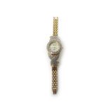 A lady's gilt metal and diamond set Ingersoll Quartz dress bracelet wristwatch,