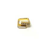 A gold, diamond and mother of pearl ring, in a square abstract design,