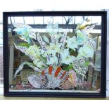 A rectangular wall mirror, with painted and foil inclusions,