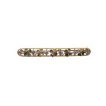 A gold and diamond set brooch,