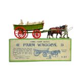A Britains Farm Waggon no.5F, from the Home Farm Series, boxed, and a General Purpose Plough, no.