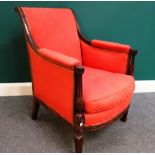 A Louis XVI style mahogany framed armchair with rollover back and semi padded down swept arms on