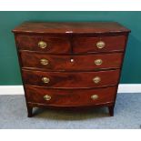 A Regency mahogany bowfront chest of two short and three long graduated drawers,