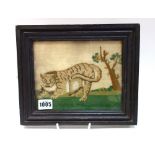 An early 19th century naïve needlework of a tiger, 15.