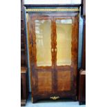 An 18th century gilt metal mounted crossbanded kingwood vitrine, with a pair of semi-glazed doors,