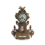 A French gilt metal and porcelain mounted mantel clock, 19th century,