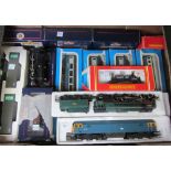 A Hornby OO gauge 'Britannia' locomotive and tender, together with three further locomotives,