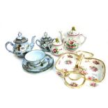 A Christian Dior part tea service decorated with flowers, a French pottery part tea service,
