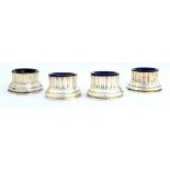A set of four Victorian silver salts, each designed as the base of a classical column, by F.