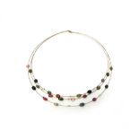 A 14ct gold, diamond and vary coloured tourmaline bead necklace, in a three row design,