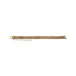 A 9ct gold bracelet, in a woven multiple link design, with a foldover clasp,