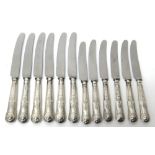 A set of six steel bladed table knives, with King's pattern handles,