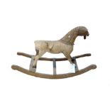 A wood and metal mounted child's velocipede/ tricycle horse,