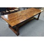 A 17th century style yew refectory table,