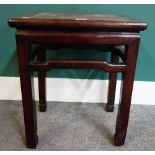 A late 19th century Chinese hardwood jardiniere stand with marble inset rectangular top on block