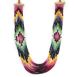 A seven strand beryl and corundum foiled bead necklace, from woven silk suspension,