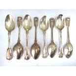 Eight Victorian and later silver fiddle thread and shell pattern dessert spoons, varying dates,