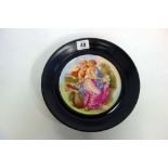 A pair of Paris porcelain plates, decorated with classical figure scenes after Angelica Kauffman,