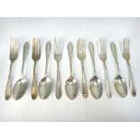 A set of six silver bead and dart pattern pastry forks, Birmingham 1931, and five silver teaspoons,