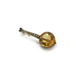 A late Victorian rose gold, citrine and half pearl brooch in the form of a banjo,