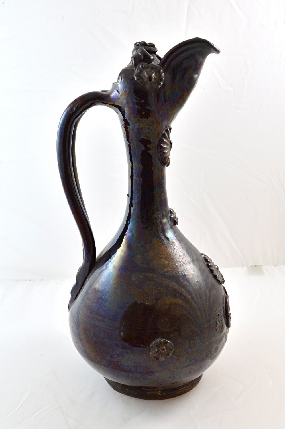 A Channakale Turkey pottery ewer, 19th century, with applied decoration,