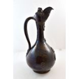 A Channakale Turkey pottery ewer, 19th century, with applied decoration,