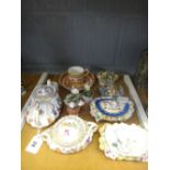 A collection of seven pieces of Dresden porcelain, a teapot and sucrier,