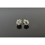 A pair of diamond stud earrings, each old-cut stone approx. 0.50cts (1.