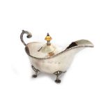 A pair of electroplated sauceboats with beaded borders, flying scroll handles,