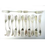 A set of eleven Victorian silver fiddle pattern dessert forks, London 1844,