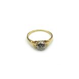 An early 20th century 18ct gold and diamond solitaire ring,