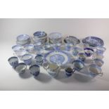 A collection of English blue transfer printed Willow pattern tea and coffee wares,