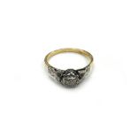 An early 20th century diamond solitaire ring, the old cut stone approximately 0.