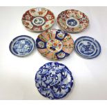 Three Japanese Hizen Imari plates, 21 & 22cm diameters, a pair of Chinese blue and white plates,